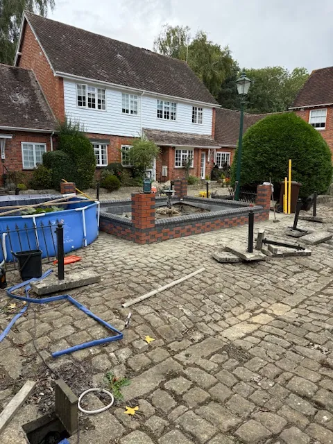 Block paving driveway with decorative brick wall features in Kent