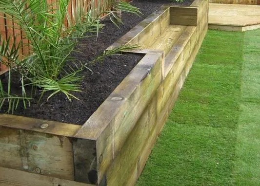New timber sleeper raised bed with decking Kent