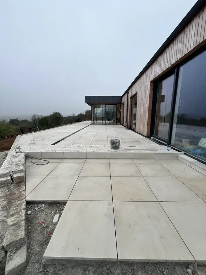 Large porcelain patio at modern property in Kent