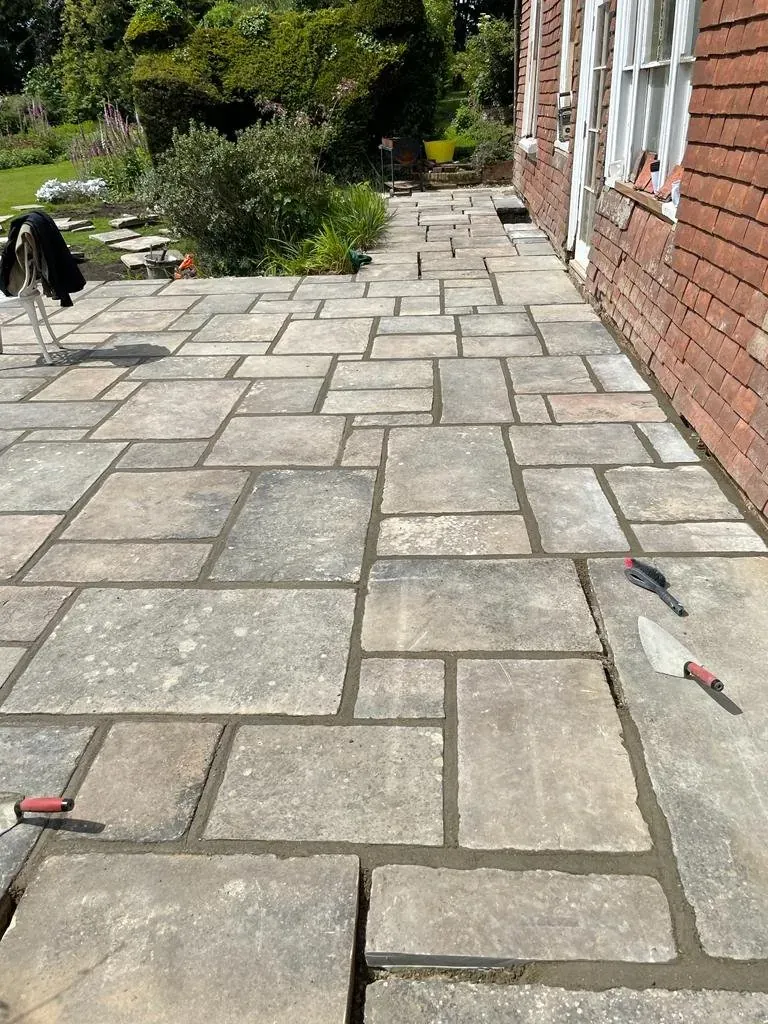 Natural stone patio installation in Kent