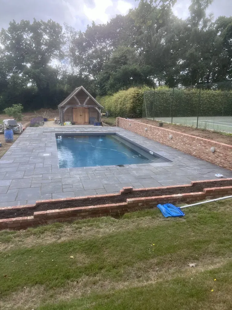 Professional pool patio with oak gazebo in Kent - Built by Pros